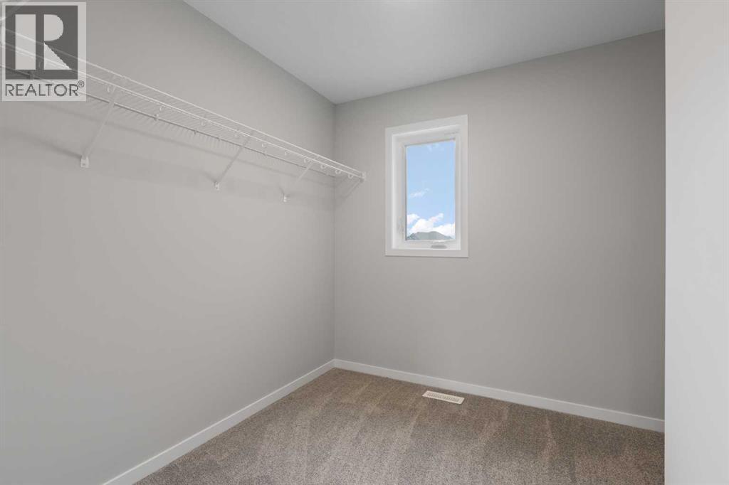 106 Monterey Bay SE, High River, Alberta  T1V 0K3 - Photo 25 - A2267748