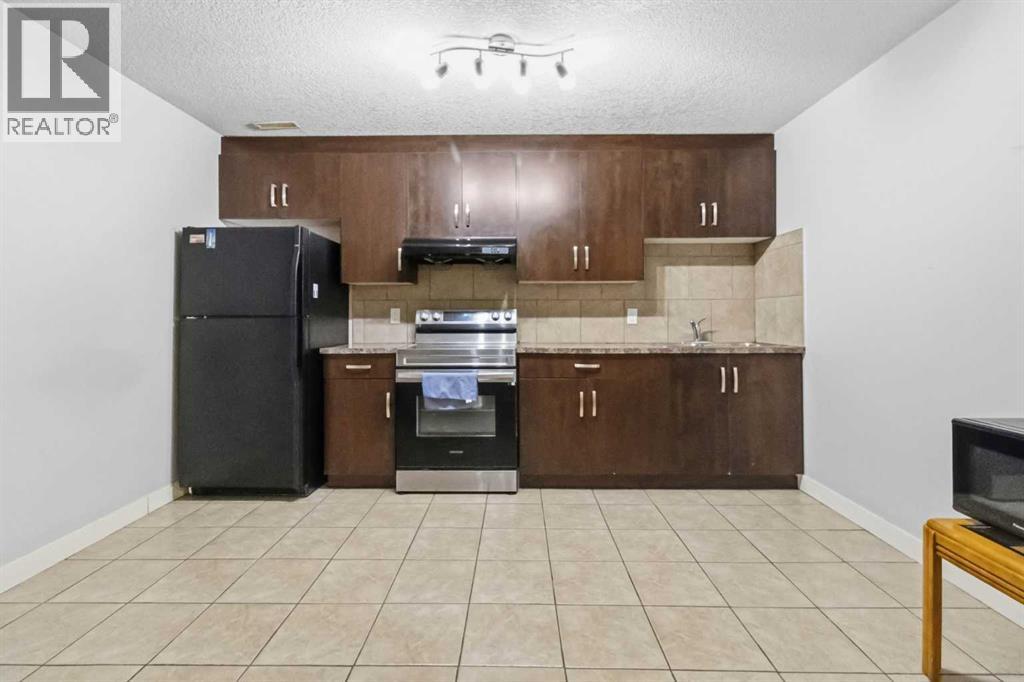 19 Saddleland Drive, Calgary, Alberta  T3J 5J3 - Photo 32 - A2301028