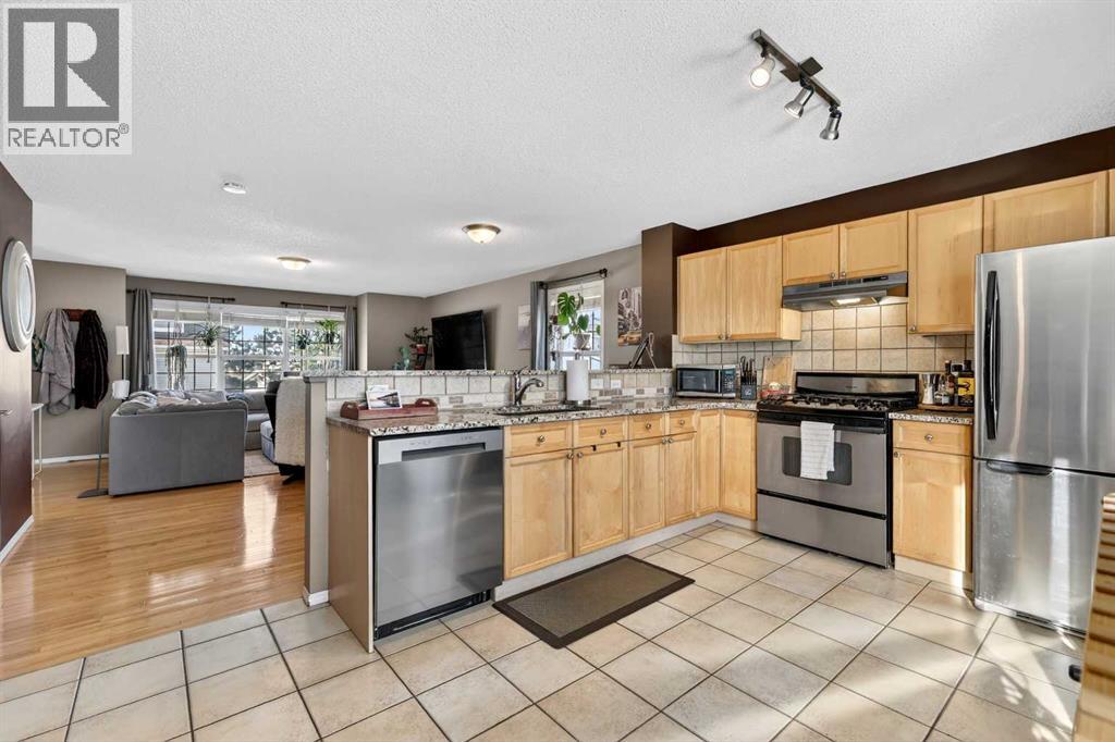 123 Tuscany Springs Gardens Nw, Calgary, Alberta  T3L 2R4 - Photo 11 - A2301647