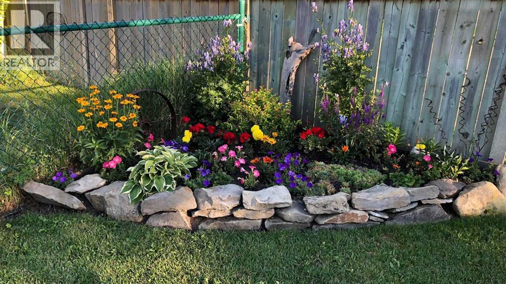 132 Bow Ridge Drive, Cochrane, Alberta  T4C 1V8 - Photo 2 - A2282061