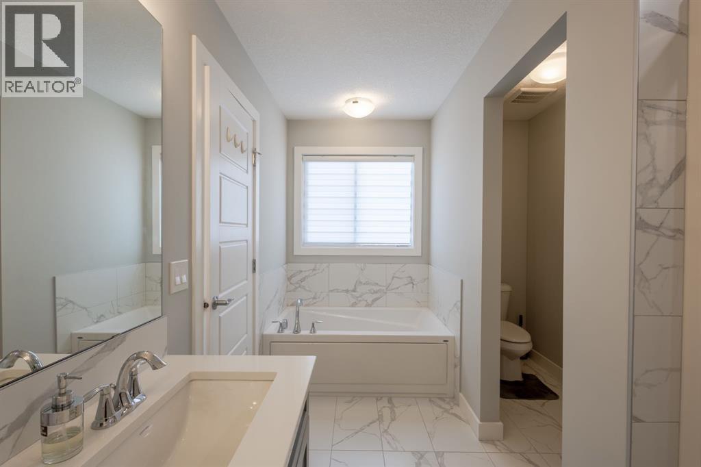 301 Crestmont Drive Sw, Calgary, Alberta  T3B 6G9 - Photo 29 - A2298416