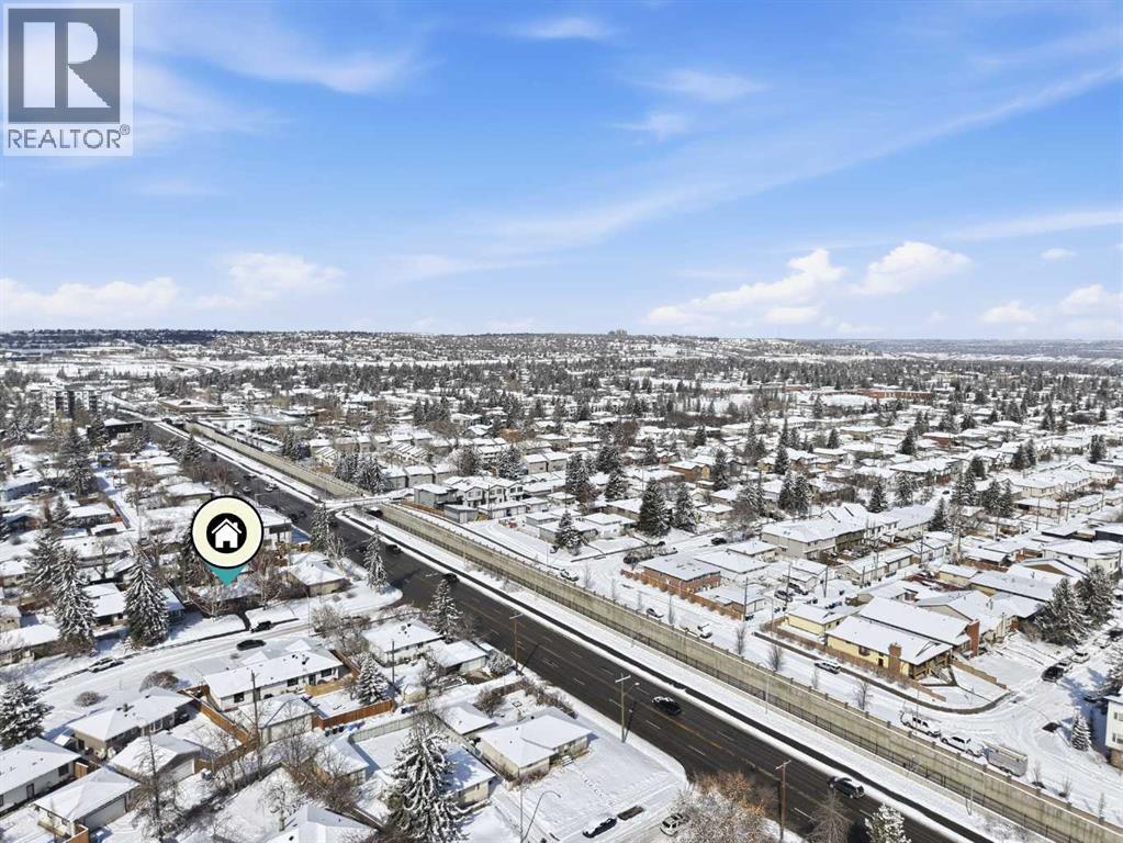 1907 Kelwood Drive SW, Calgary, Alberta  T3E 3Z4 - Photo 5 - A2302714