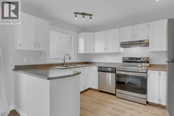 220 Cedarbrook Bay Sw, Calgary, Alberta  T2W 4R4 - Photo 5 - A2301638