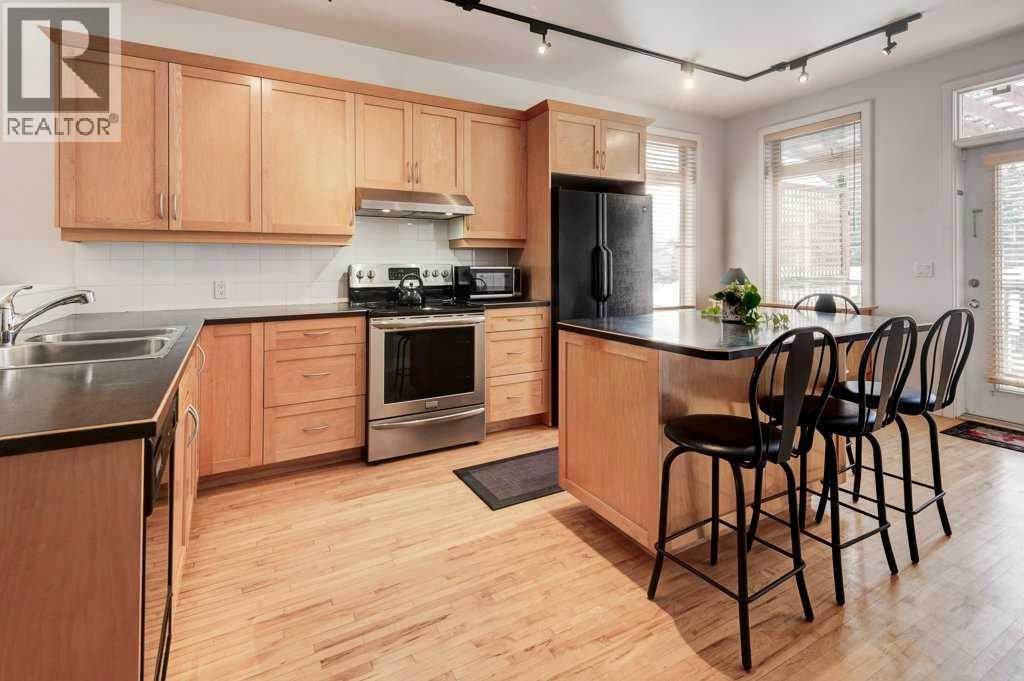 703 52 Avenue SW, Calgary, Alberta  T2V 0B6 - Photo 9 - A2299270