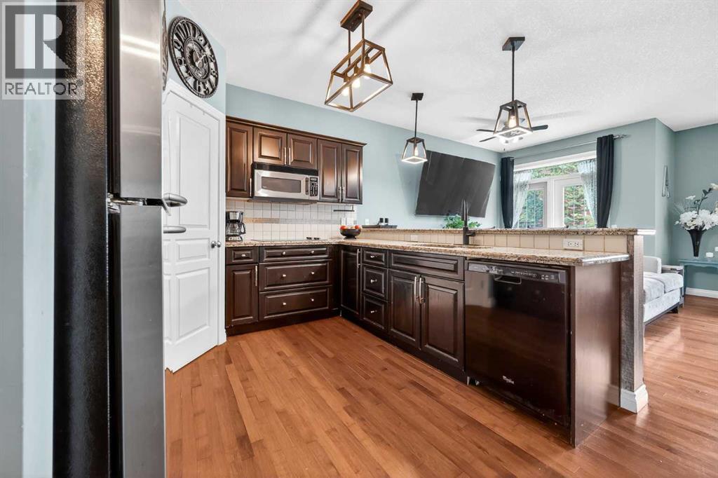 8 Tucker Circle, Okotoks, Alberta  T1S 2J6 - Photo 8 - A2301273