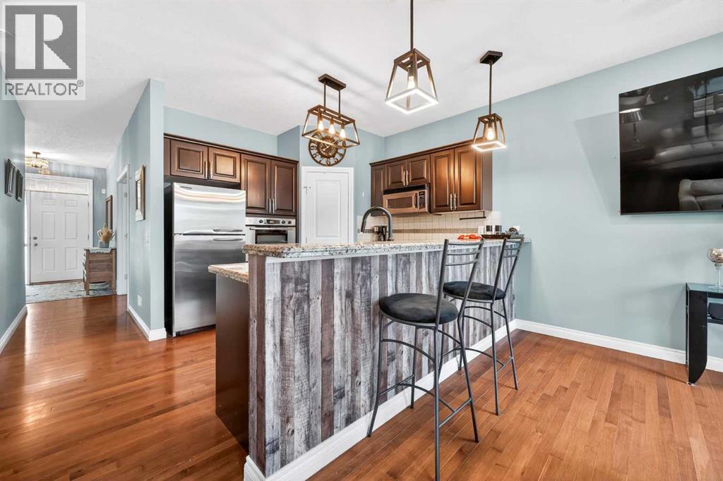 8 Tucker Circle, Okotoks, Alberta  T1S 2J6 - Photo 9 - A2301273