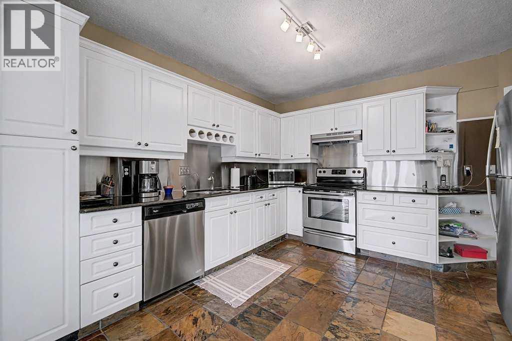 1440 9 Street NW, Calgary, Alberta  T2M 3L2 - Photo 15 - A2299753