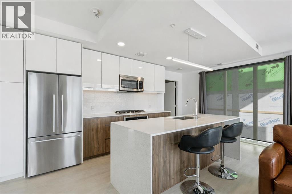 211, 327 9a Street Nw, Calgary, Alberta  T2N 1T7 - Photo 2 - A2298925