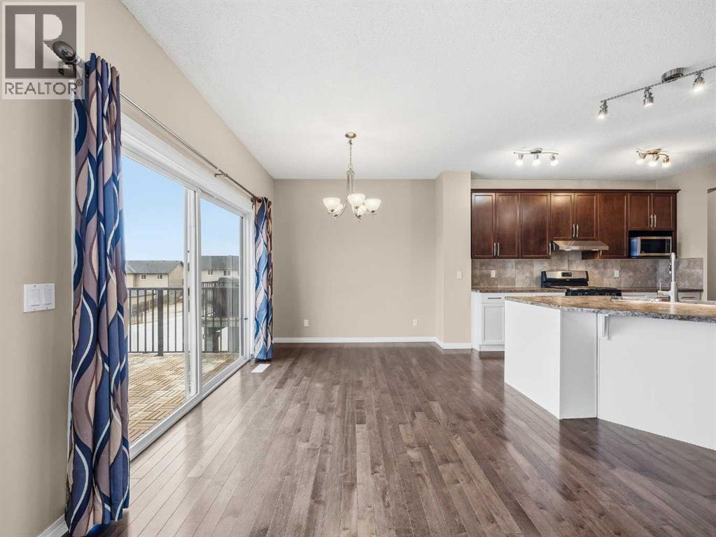 32 Panatella Parade NW, Calgary, Alberta  T3K 0T8 - Photo 9 - A2302640