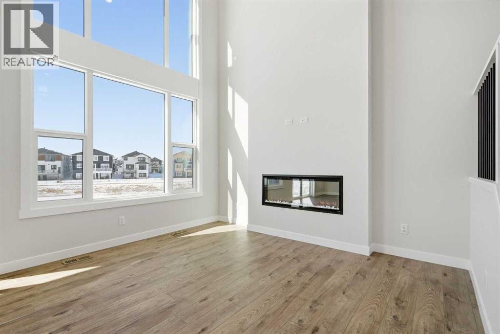 302 Kinniburgh Loop, Chestermere, Alberta  T1X 3C3 - Photo 9 - A2289506