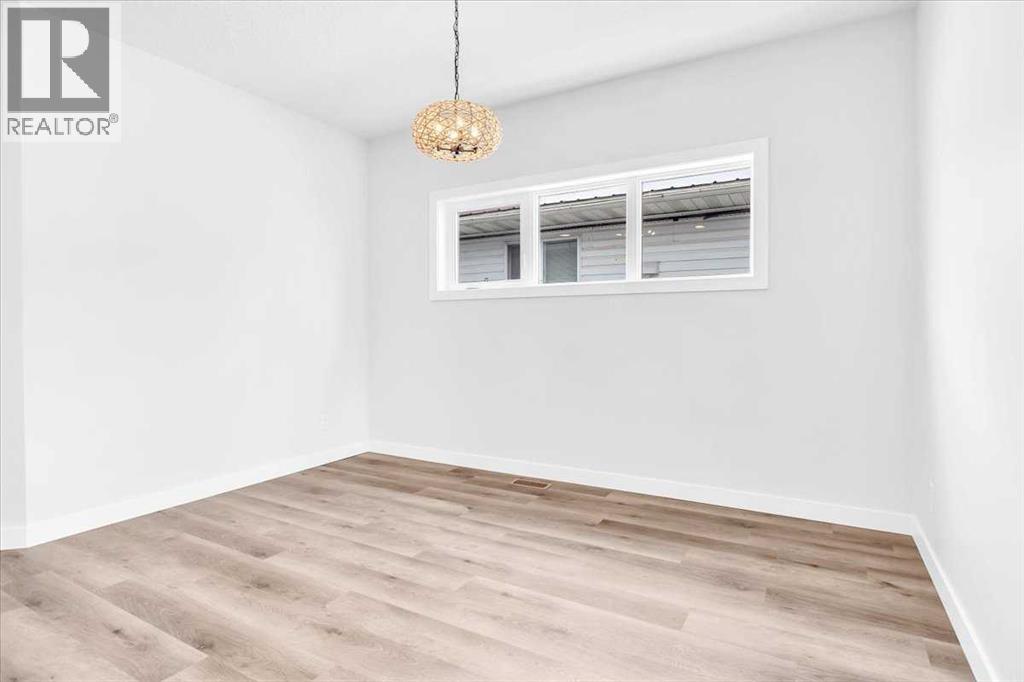 1014 Limit Avenue, Crossfield, Alberta  T0M 0S0 - Photo 12 - A2292015