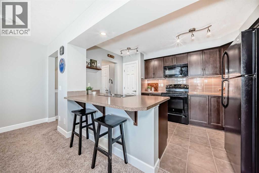 468 Windstone Grove Sw, Airdrie, Alberta  T4B 3T4 - Photo 6 - A2298805