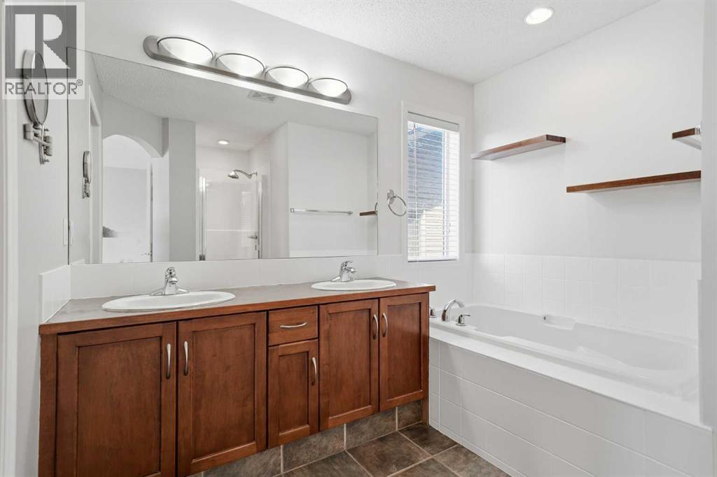 155 Cimarron Grove Circle, Okotoks, Alberta  T1S 2M1 - Photo 25 - A2274025