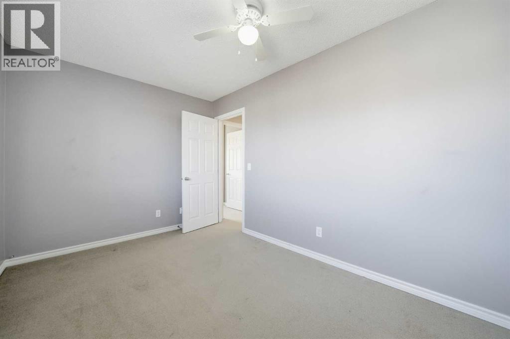 155 Cimarron Grove Circle, Okotoks, Alberta  T1S 2M1 - Photo 33 - A2274025