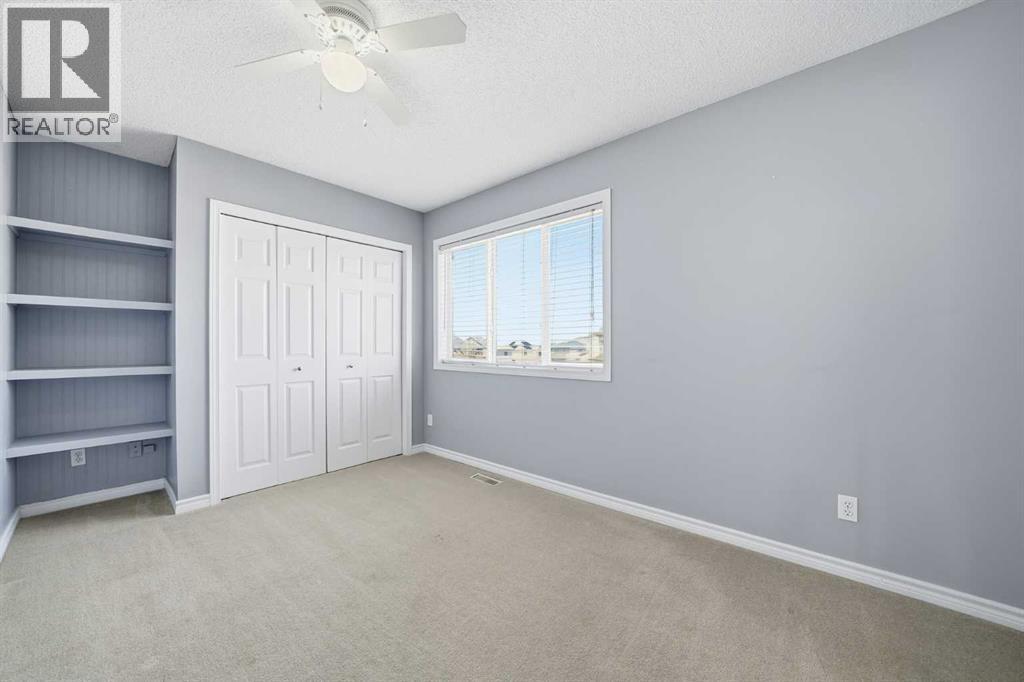 155 Cimarron Grove Circle, Okotoks, Alberta  T1S 2M1 - Photo 32 - A2274025
