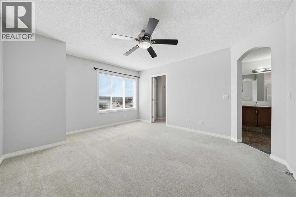 155 Cimarron Grove Circle, Okotoks, Alberta  T1S 2M1 - Photo 22 - A2274025