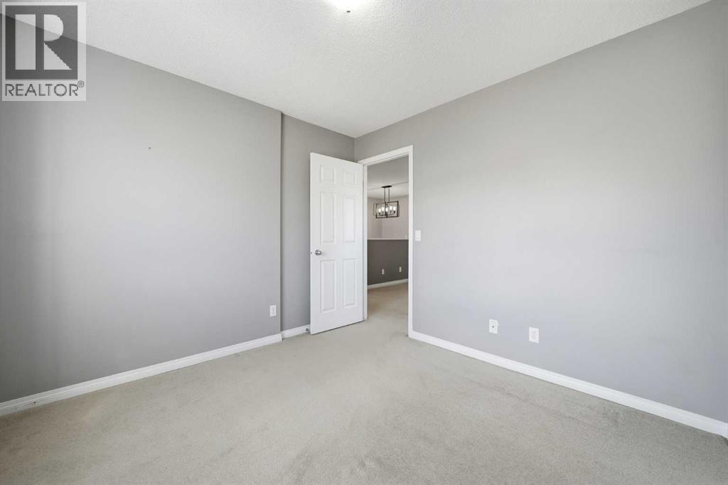 155 Cimarron Grove Circle, Okotoks, Alberta  T1S 2M1 - Photo 31 - A2274025