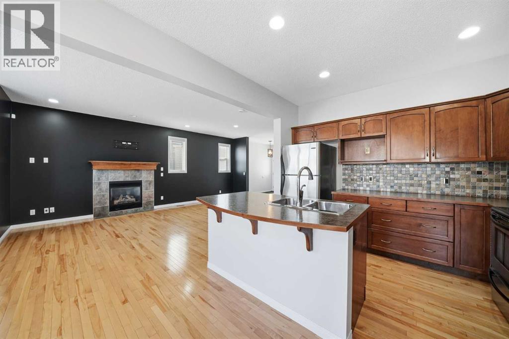 155 Cimarron Grove Circle, Okotoks, Alberta  T1S 2M1 - Photo 9 - A2274025