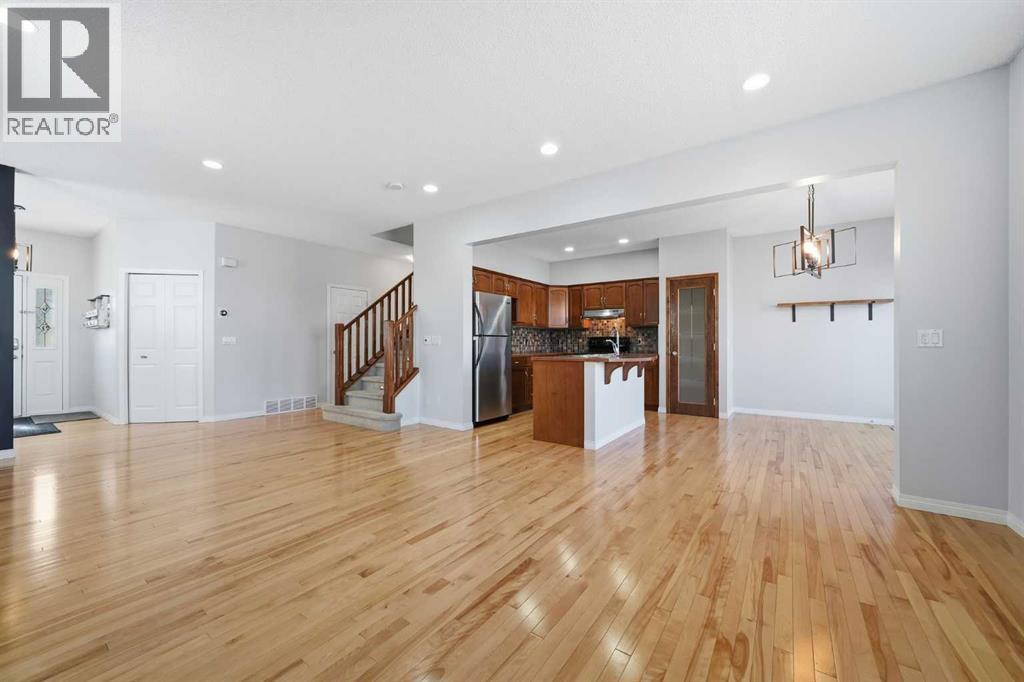 155 Cimarron Grove Circle, Okotoks, Alberta  T1S 2M1 - Photo 4 - A2274025