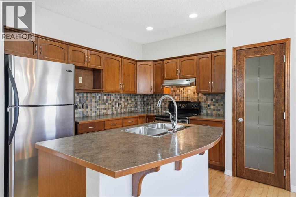 155 Cimarron Grove Circle, Okotoks, Alberta  T1S 2M1 - Photo 15 - A2274025