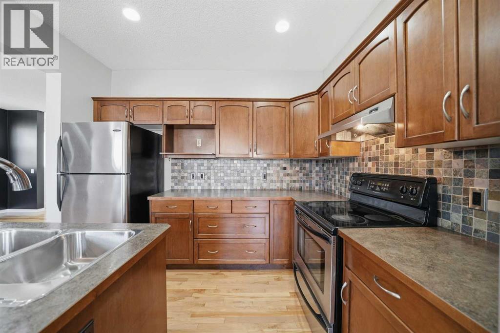 155 Cimarron Grove Circle, Okotoks, Alberta  T1S 2M1 - Photo 10 - A2274025