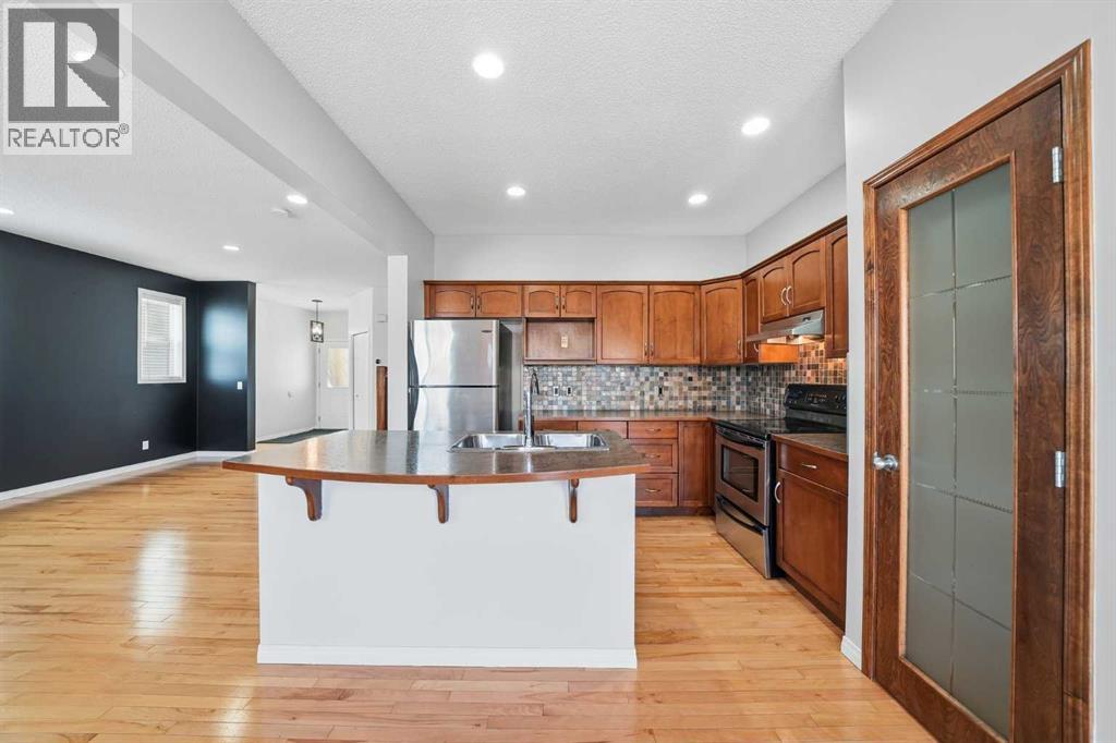 155 Cimarron Grove Circle, Okotoks, Alberta  T1S 2M1 - Photo 13 - A2274025