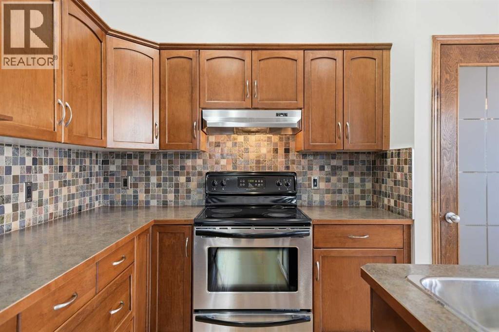 155 Cimarron Grove Circle, Okotoks, Alberta  T1S 2M1 - Photo 16 - A2274025