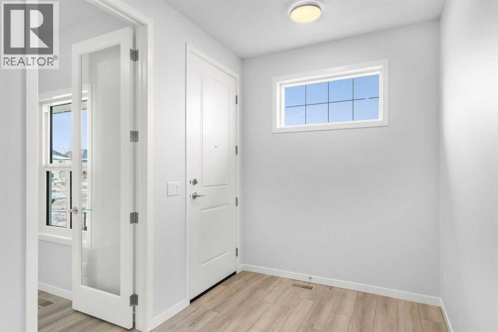 659 Buffaloberry Manor SE, Calgary, Alberta  T3M 3Z3 - Photo 26 - A2282929