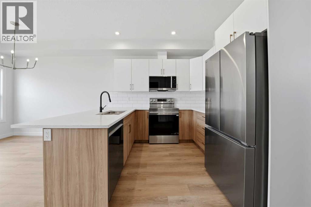 57 Pinnacle Close, Blackfalds, Alberta  T4M 0M3 - Photo 4 - A2284383