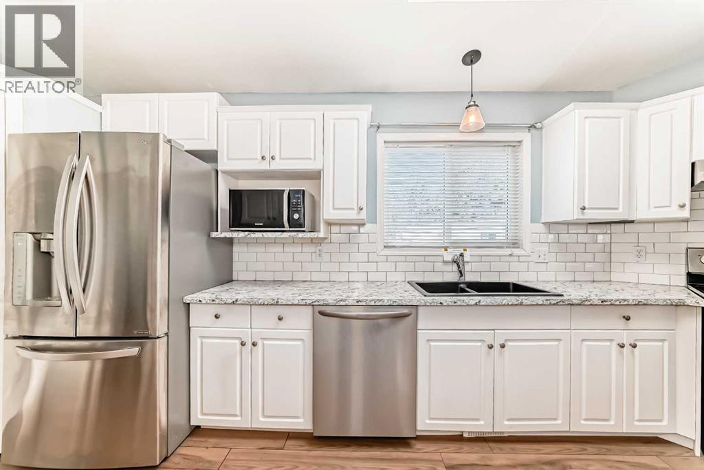 360 Burroughs Circle Ne, Calgary, Alberta  T1Y 6K3 - Photo 8 - A2285775