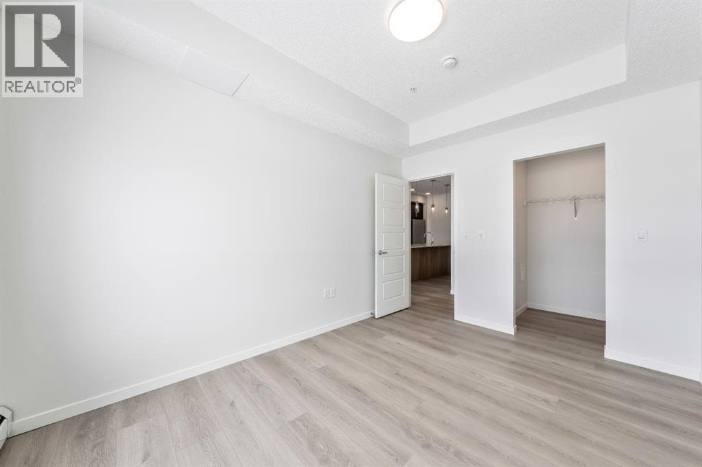 419, 245 Edith Place Nw, Calgary, Alberta  T3R 2M7 - Photo 5 - A2299502