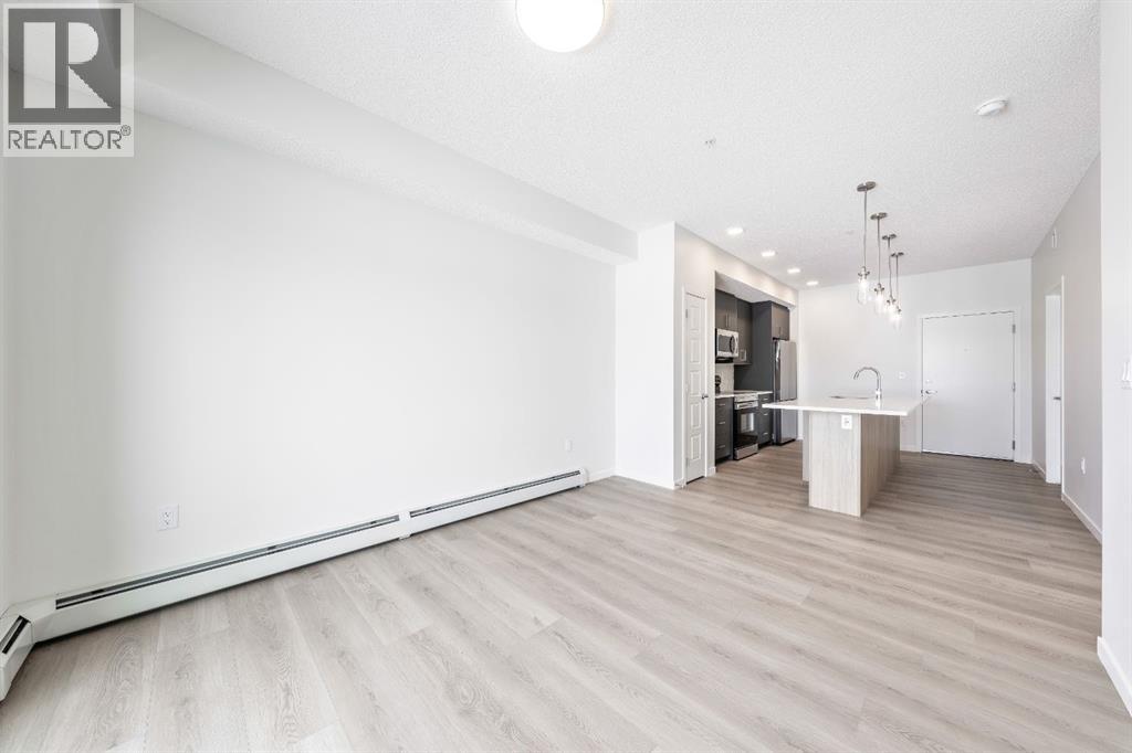 419, 245 Edith Place Nw, Calgary, Alberta  T3R 2M7 - Photo 3 - A2299502