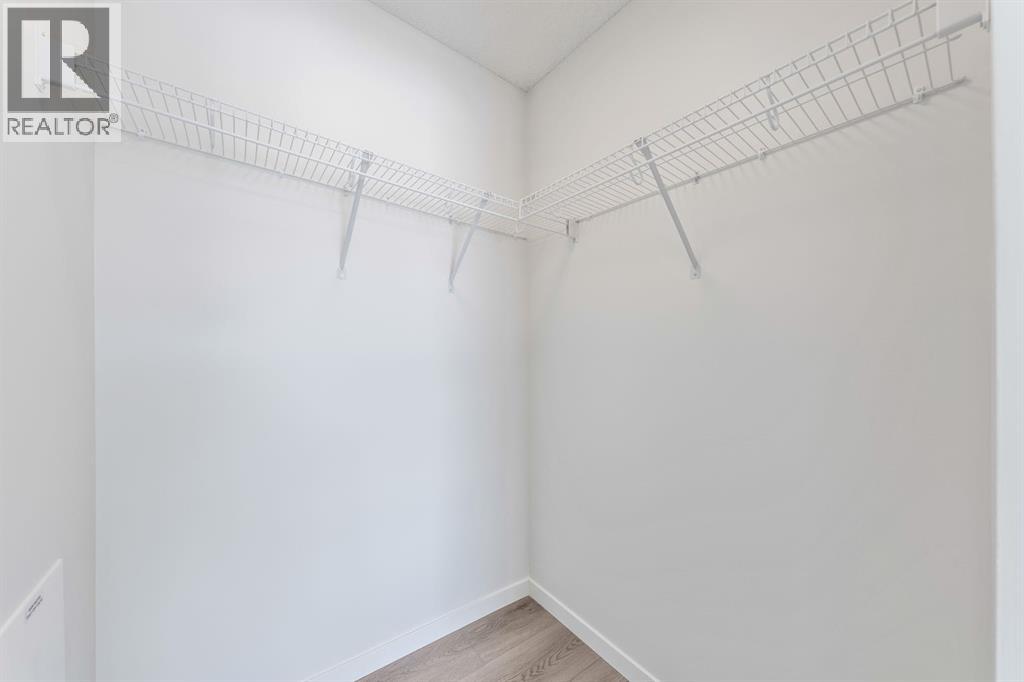 419, 245 Edith Place Nw, Calgary, Alberta  T3R 2M7 - Photo 6 - A2299502