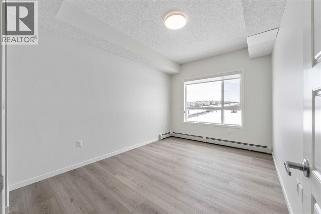 419, 245 Edith Place Nw, Calgary, Alberta  T3R 2M7 - Photo 4 - A2299502