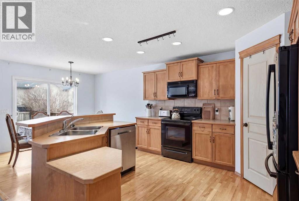 62 New Brighton Circle Se, Calgary, Alberta  T2Z 4B3 - Photo 6 - A2301403