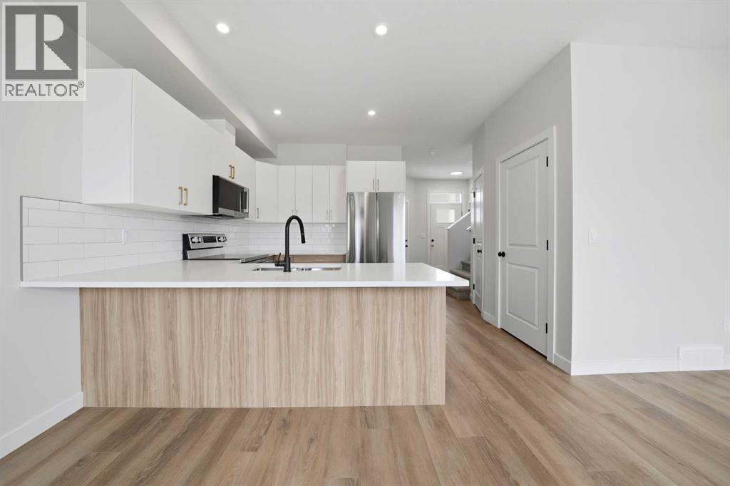 61 Pinnacle Close, Blackfalds, Alberta  T4M 0M3 - Photo 6 - A2284627