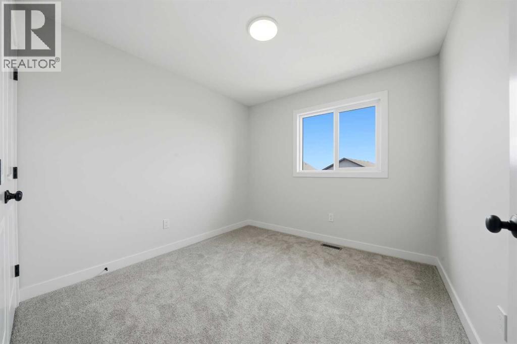 61 Pinnacle Close, Blackfalds, Alberta  T4M 0M3 - Photo 16 - A2284627