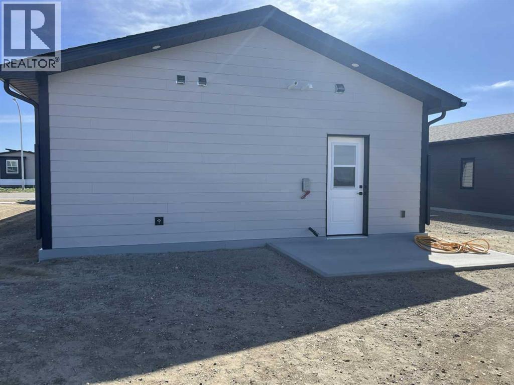 7042 48 Street, Taber, Alberta  T1G 0G7 - Photo 4 - A2302264