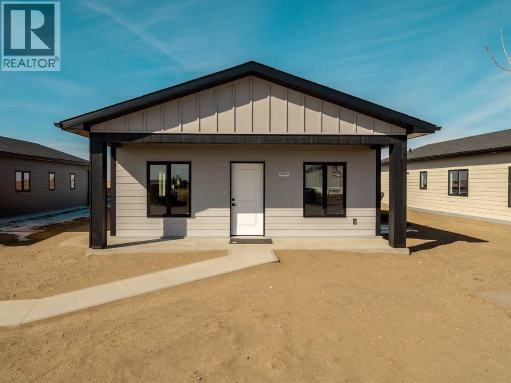 7042 48 Street, Taber, Alberta  T1G 0G7 - Photo 3 - A2302264