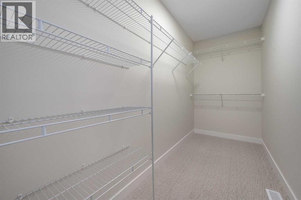 84 Waterford Manor, Chestermere, Alberta  T1X 2T9 - Photo 22 - A2302935