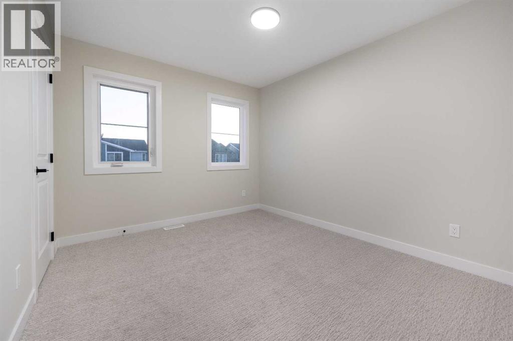 84 Waterford Manor, Chestermere, Alberta  T1X 2T9 - Photo 23 - A2302935