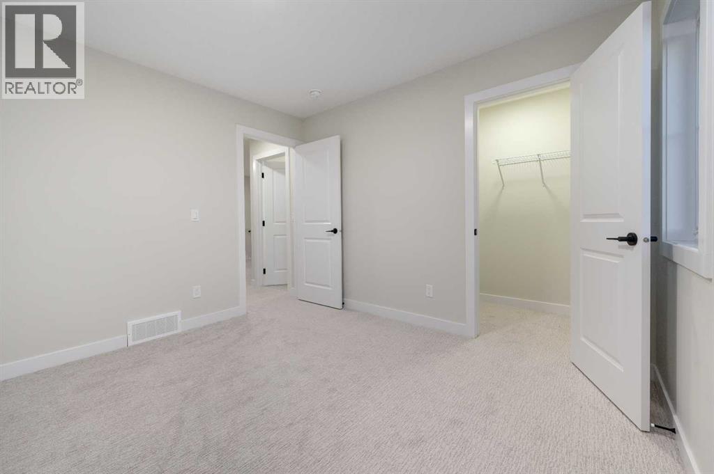 84 Waterford Manor, Chestermere, Alberta  T1X 2T9 - Photo 24 - A2302935