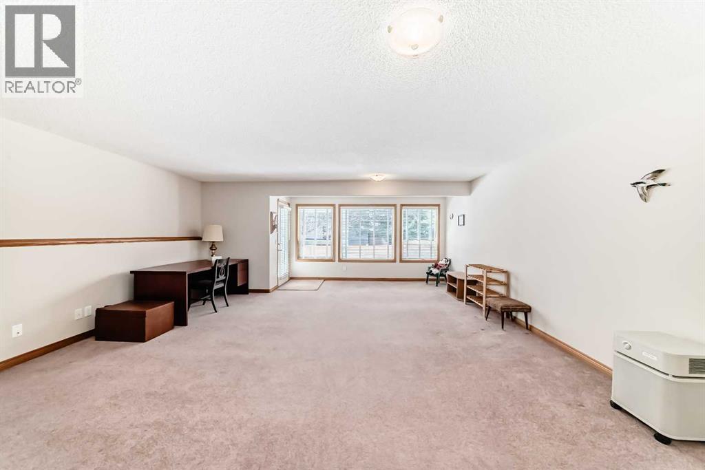 220 Rocky Ridge Villas Nw, Calgary, Alberta  T3G 4R3 - Photo 30 - A2297086