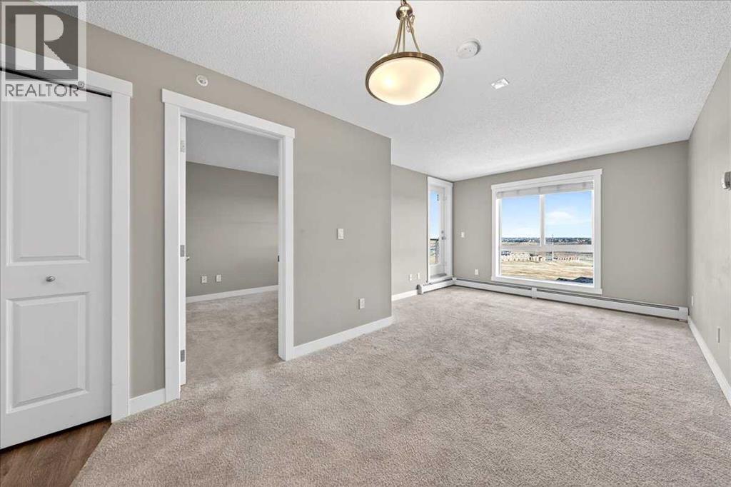 607, 20 Kincora Glen Park Nw, Calgary, Alberta  T3R 1R9 - Photo 4 - A2300628