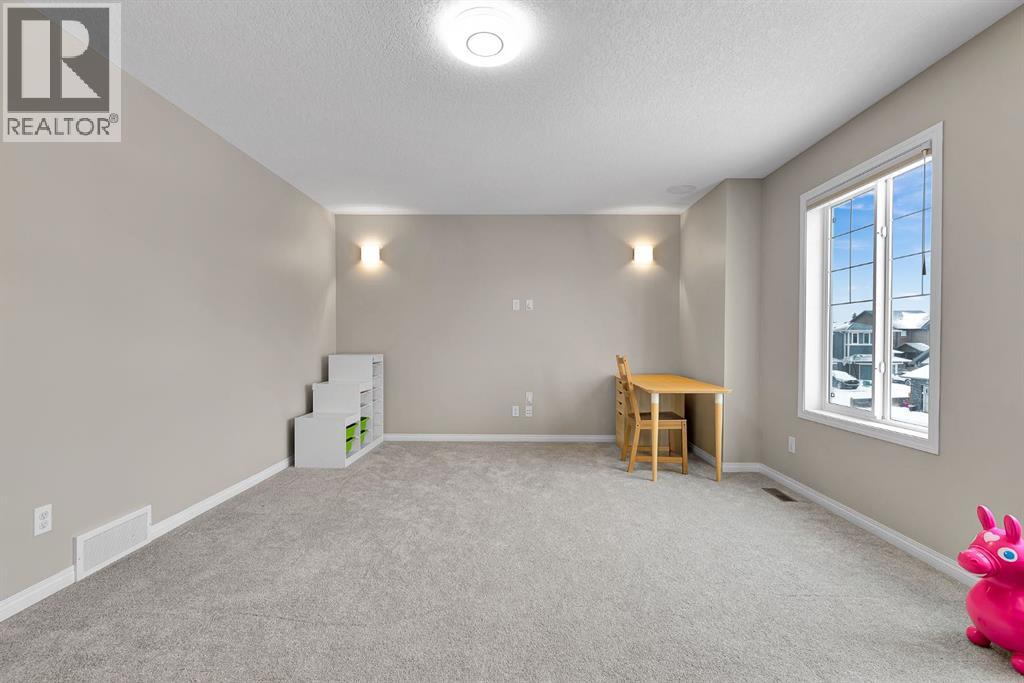 177 Cougar Ridge Close Sw, Calgary, Alberta  T3H 0V4 - Photo 25 - A2292847