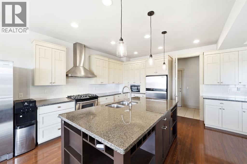 243 Whispering Water Way, Rural Rocky View County, Alberta  T3Z 3T4 - Photo 7 - A2302397