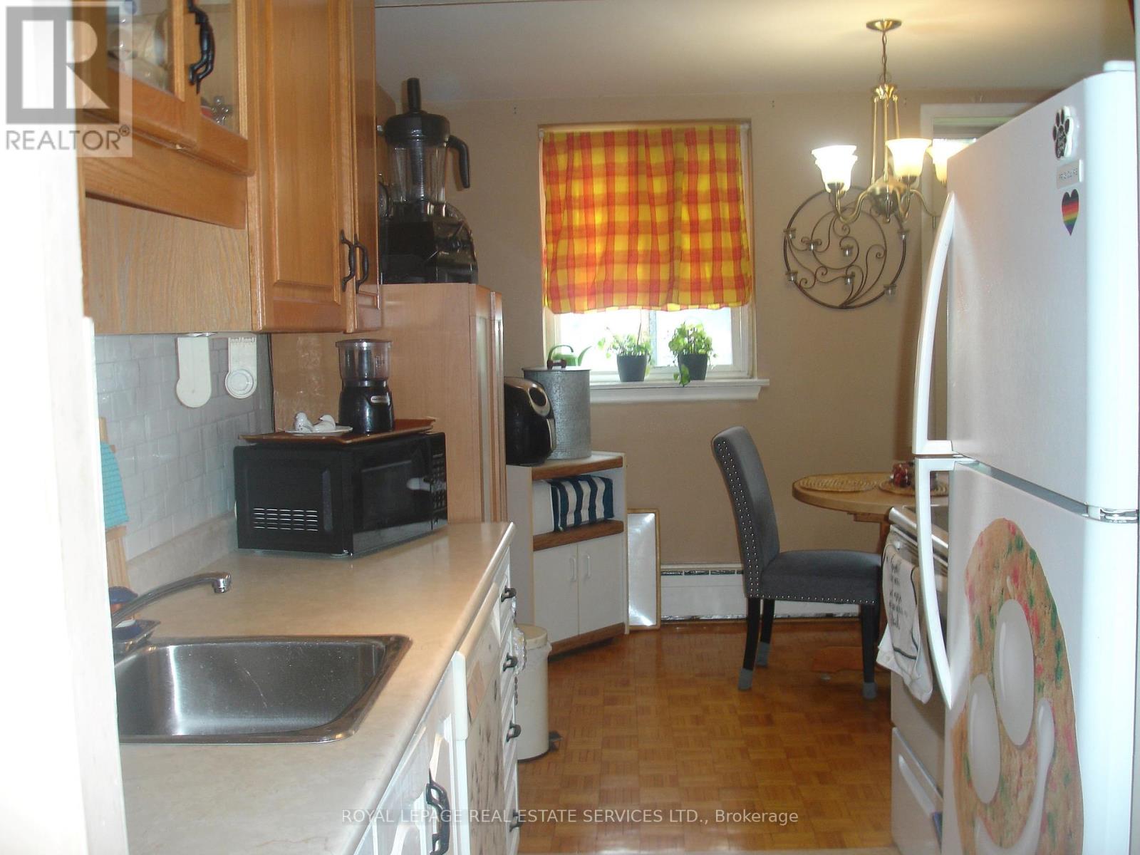 101 - 57 Neptune Drive, Toronto, Ontario  M6A 1X2 - Photo 4 - C12689678