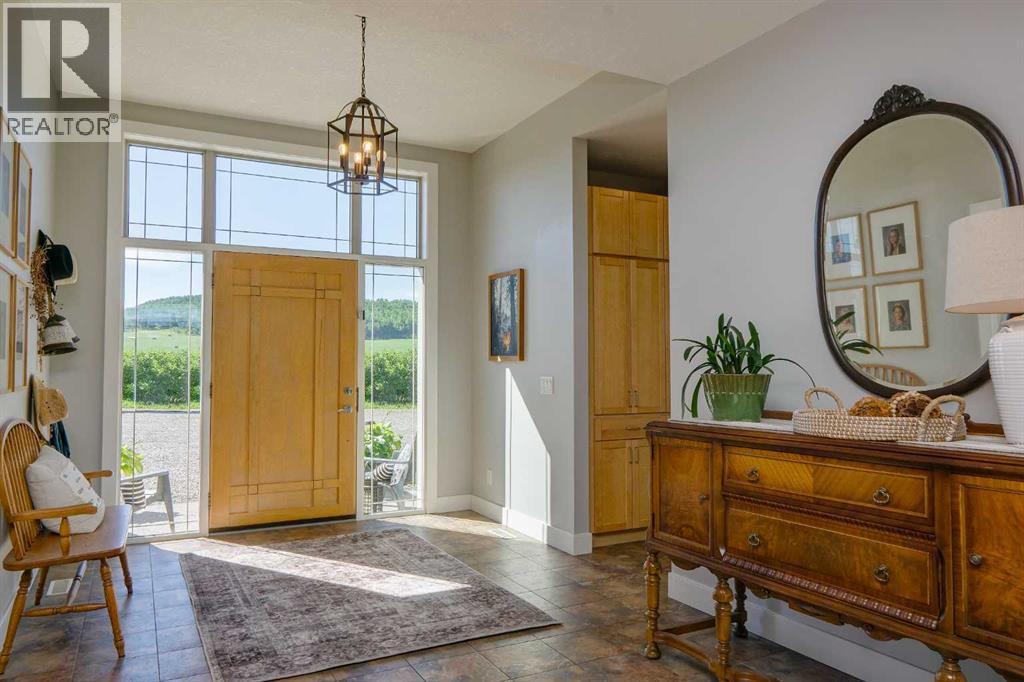 254069 Towers Trail, Rural Rocky View County, Alberta  T4C 2A3 - Photo 3 - A2302358