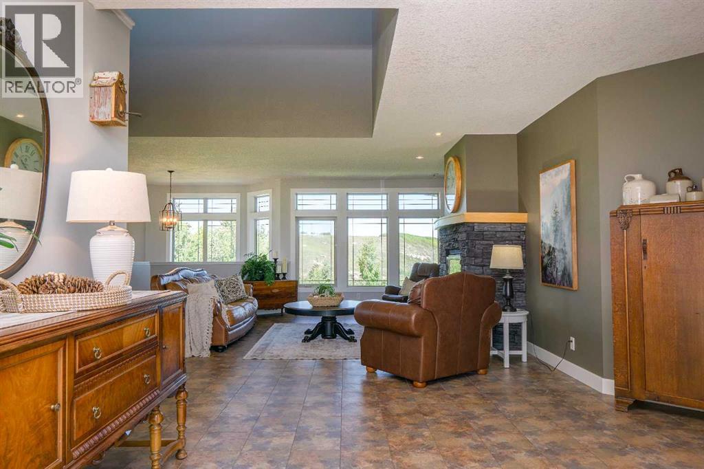 254069 Towers Trail, Rural Rocky View County, Alberta  T4C 2A3 - Photo 5 - A2302358