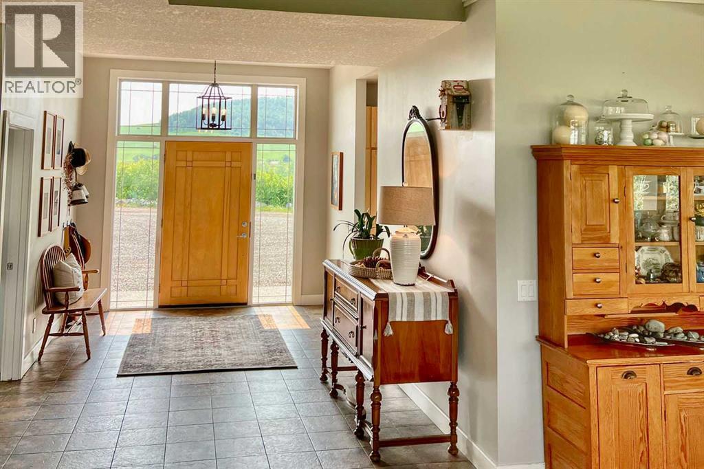 254069 Towers Trail, Rural Rocky View County, Alberta  T4C 2A3 - Photo 4 - A2302358